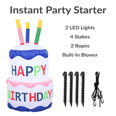 Sunnydaze inflatable cake lit at night providing bright celebration ambiance