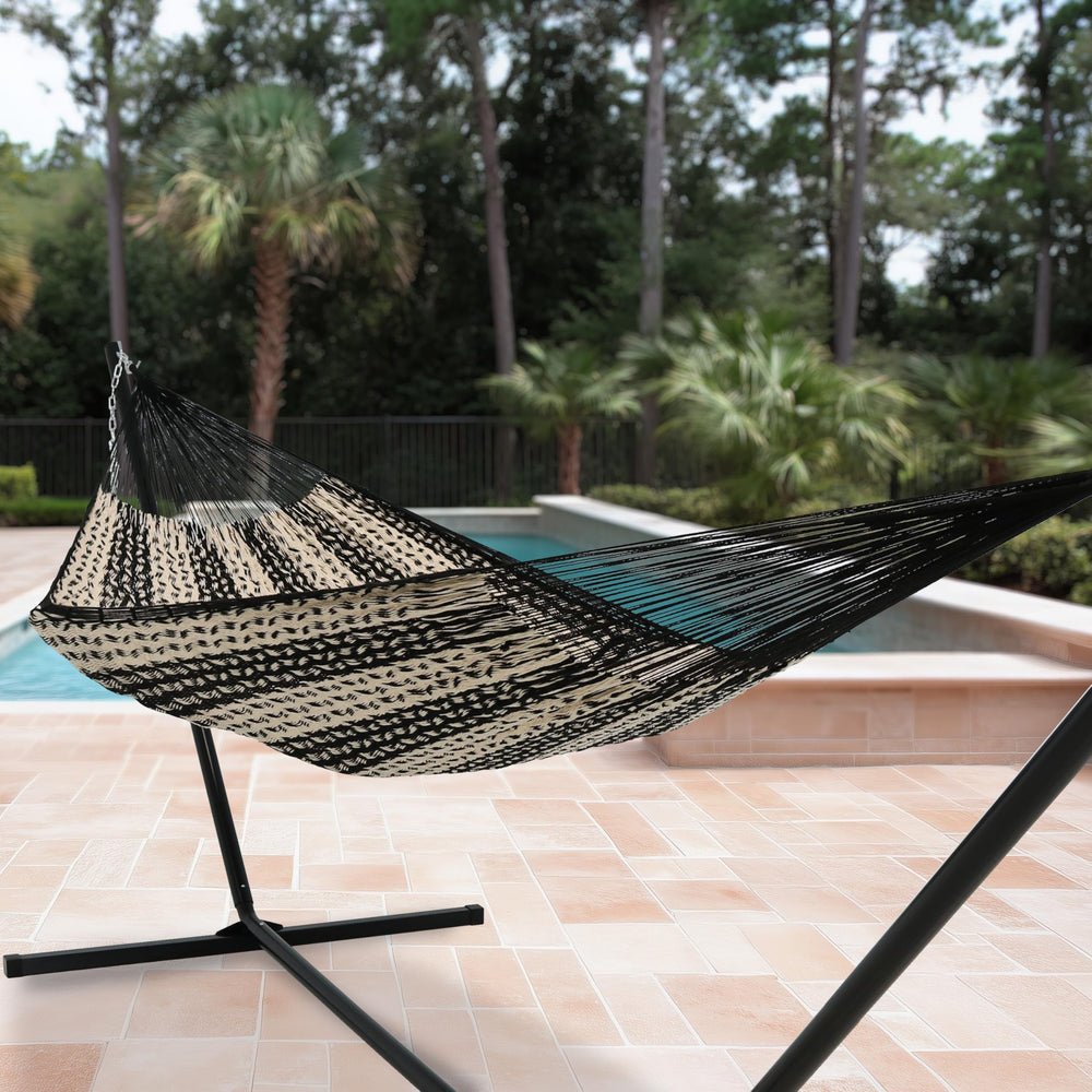 Sunnydaze family lounging together in hammock showing roomy 625 lb capacity benefit