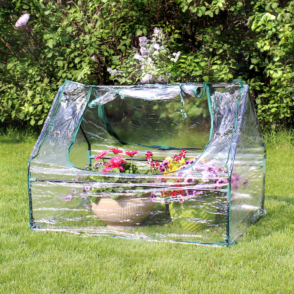 Sunnydaze clear PVC cover close-up demonstrating weather protection and light transmission
