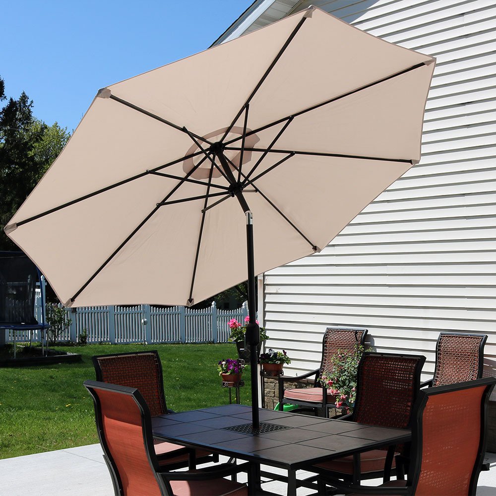 Sunnydaze scale comparison next to chair shows true 9ft coverage
