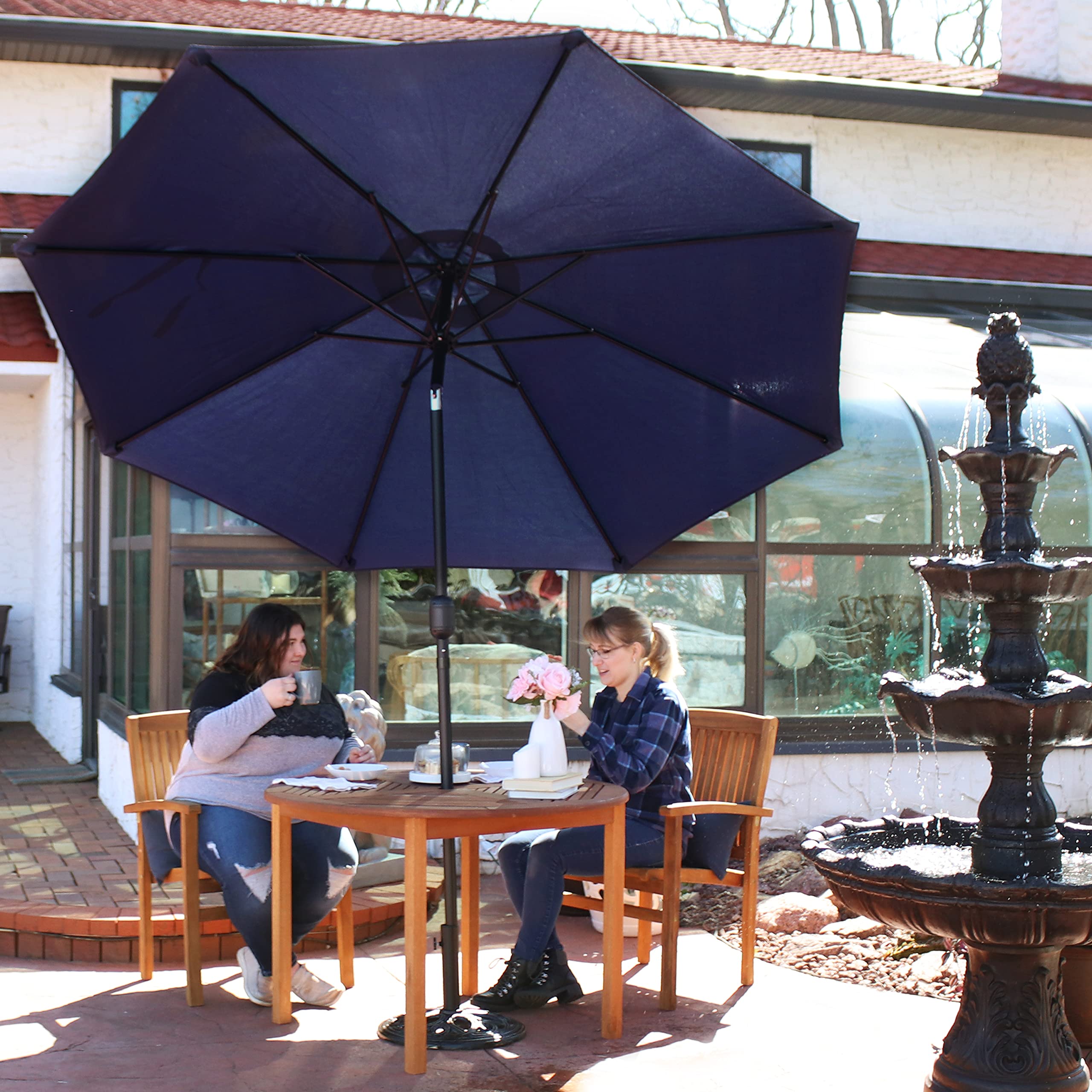 Sunnydaze umbrella in-use on patio shading table and comfortable seating benefit