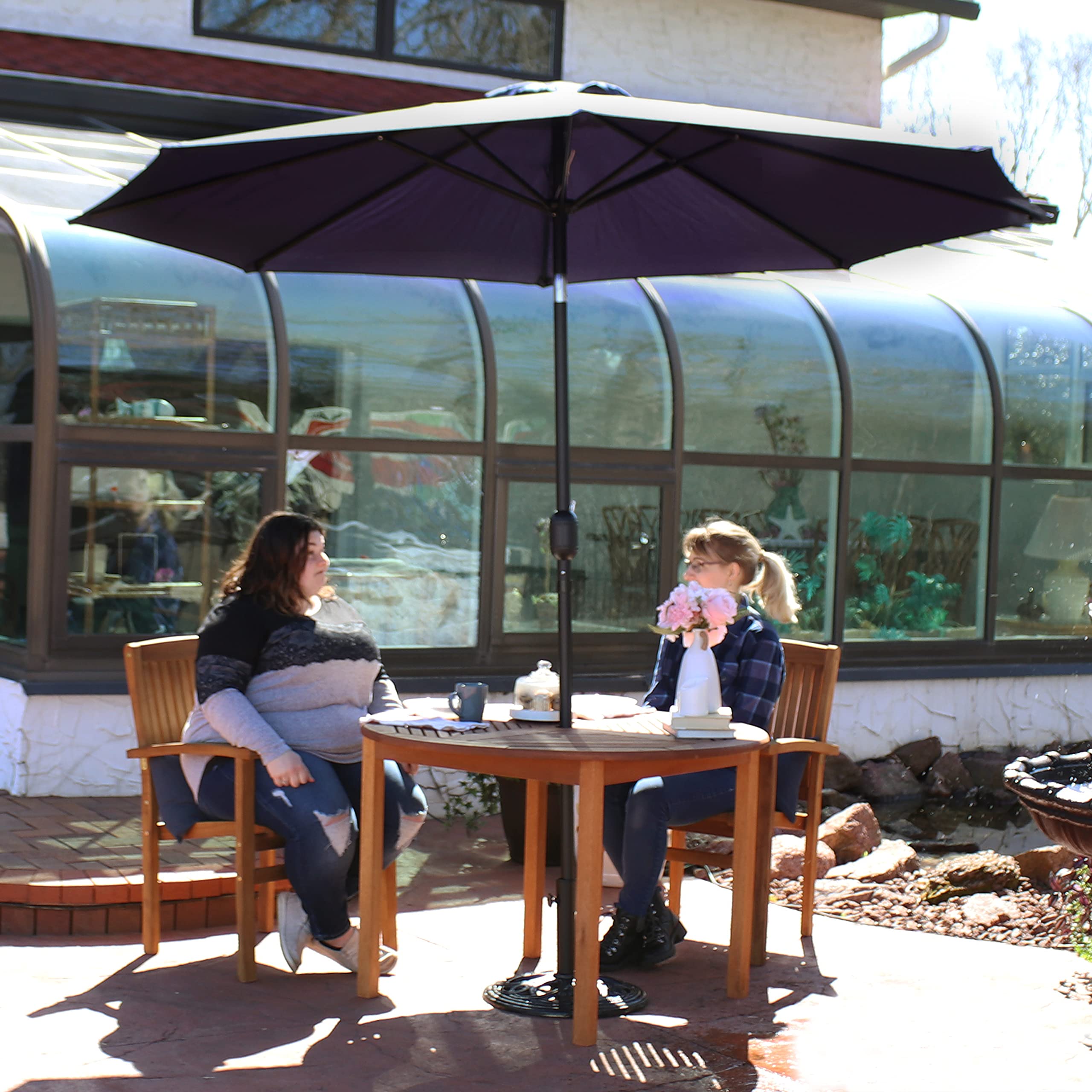 Sunnydaze umbrella next to 36-inch table showing coverage and scale benefit
