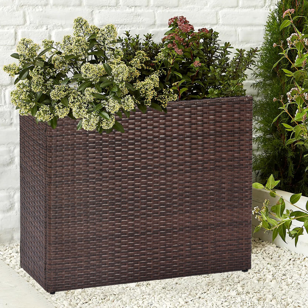 SUNNYPARK planter next to chair showing scale and how it fits narrow outdoor spaces