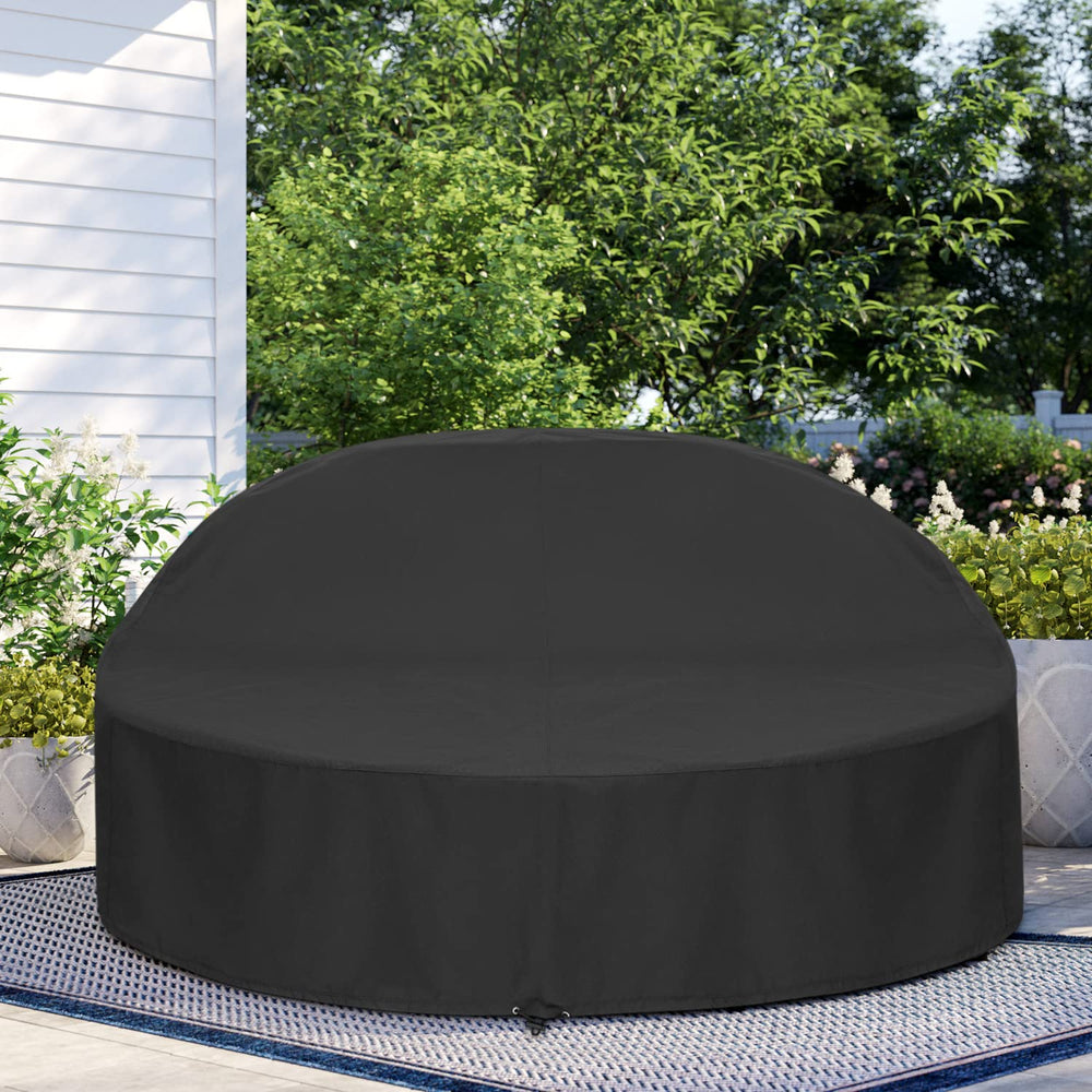 SunPatio cover on daybed in backyard lifestyle scene demonstrating all-weather use