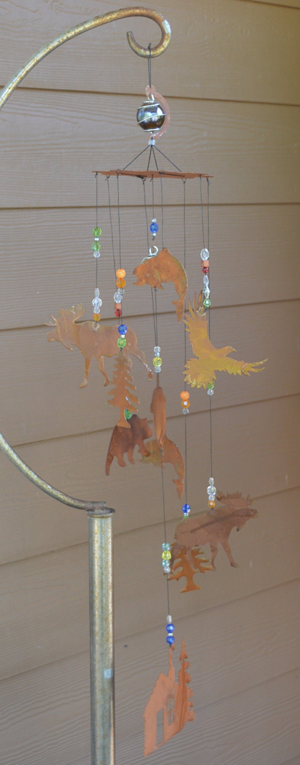 Sunset Vista Designs close-up of glass marble and coiled wire accents highlighting handcrafted detail