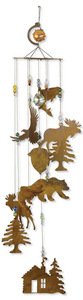 Sunset Vista Designs large rustic cabin wind chime hung on porch showing full silhouette and charm