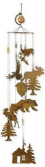 Sunset Vista Designs large rustic cabin wind chime hung on porch showing full silhouette and charm
