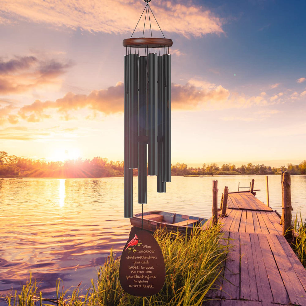 Suntimber wind chime in garden scene offering a peaceful memorial focal point