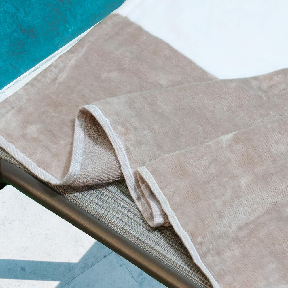 SUPERIOR cover on chair with ruler comparison showing generous 32x102 size