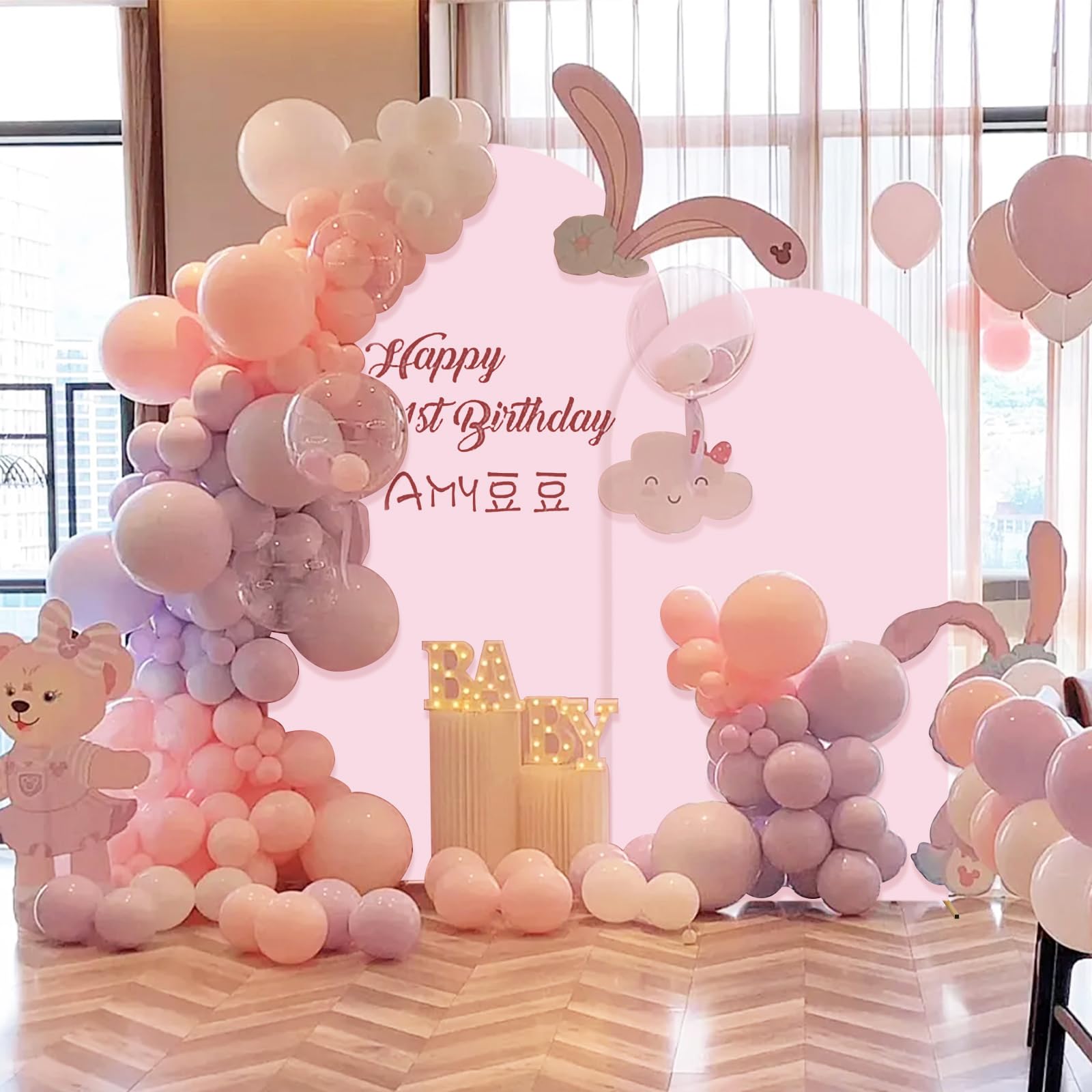 SuuWoee arch used as photo booth backdrop showing guest-friendly setup