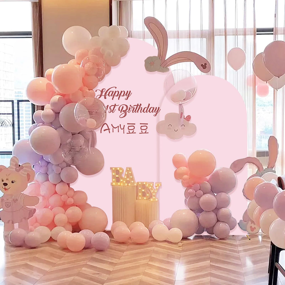 SuuWoee arch used as photo booth backdrop showing guest-friendly setup