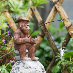 SUYNYBHF fishing pole detail on statue showing realistic accessory and craftsmanship