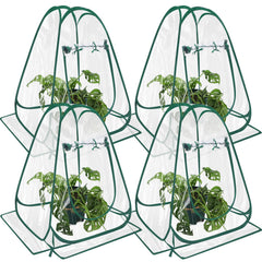 Suzile front view of four pop-up greenhouses protecting multiple plants, compact coverage benefit