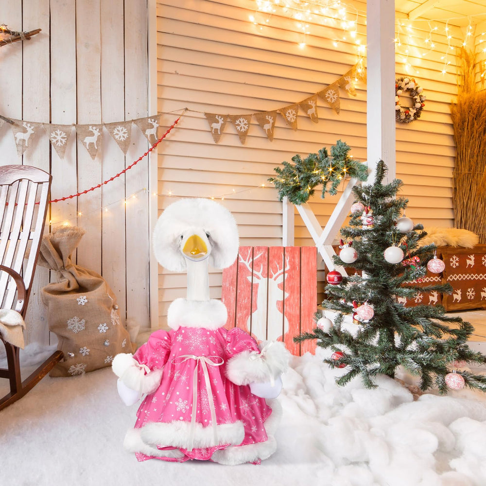 Suzile porch scene at dusk showing pink goose outfit creating welcoming holiday ambiance