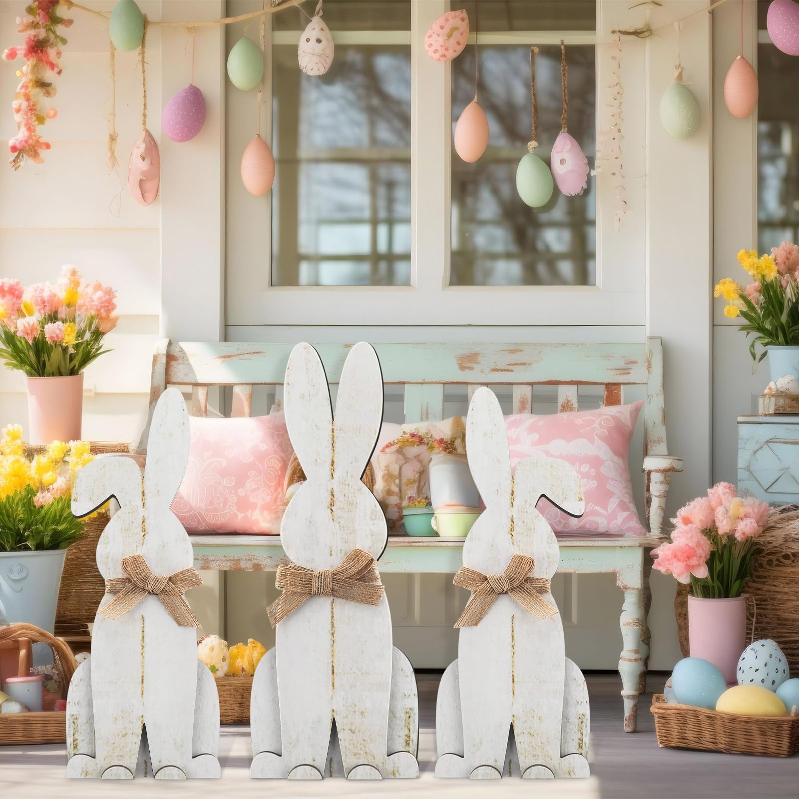 Suzile three bunnies grouped on a porch creating welcoming Easter curb appeal