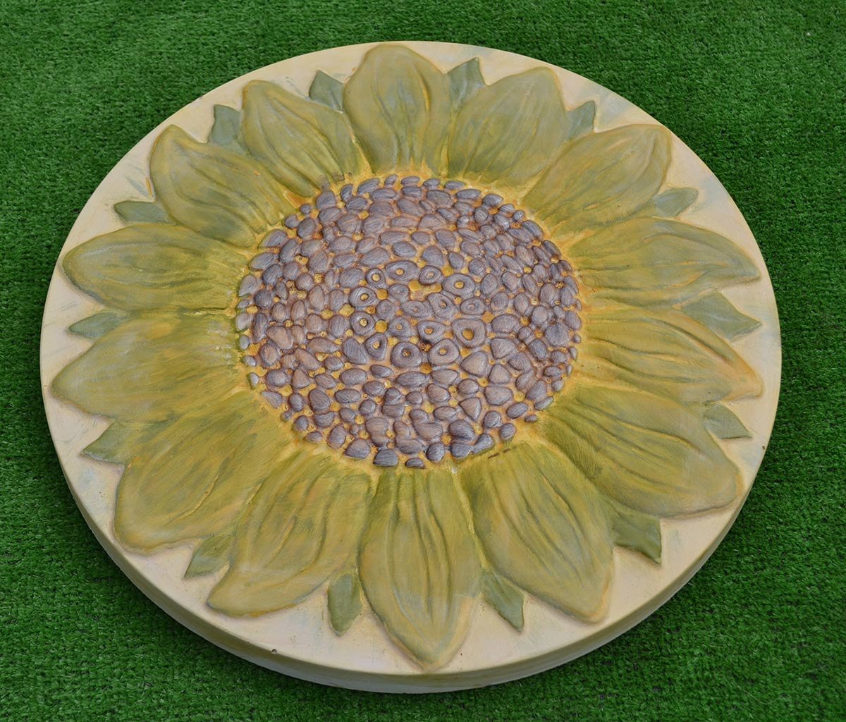 SvitMolds finished concrete sunflower stepping stone showing crisp texture benefit