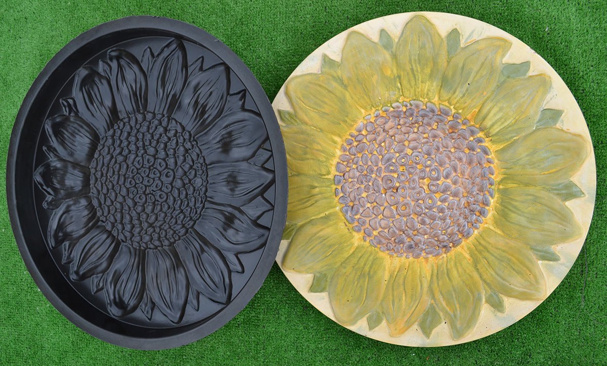 SvitMolds installed sunflower stepping stones in garden path showing decorative appeal