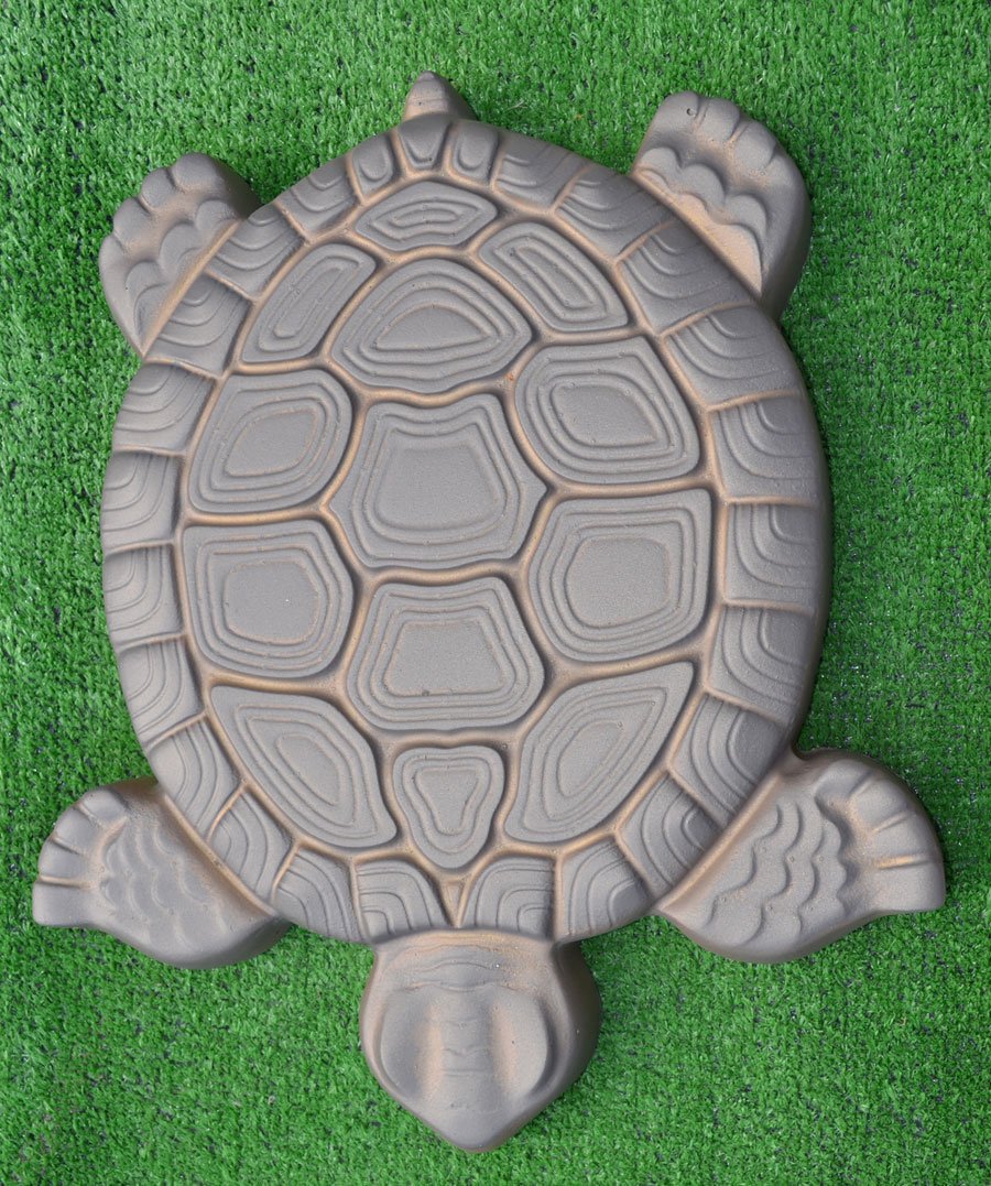 SvitMolds turtle pavers installed in garden path showing cohesive landscaping benefit