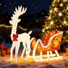 Sweetcrispy front view of reindeer and sleigh showcasing festive curb appeal