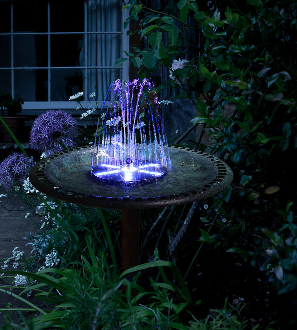 SZMP illuminated fountain at night creating star-like glow and ambiance