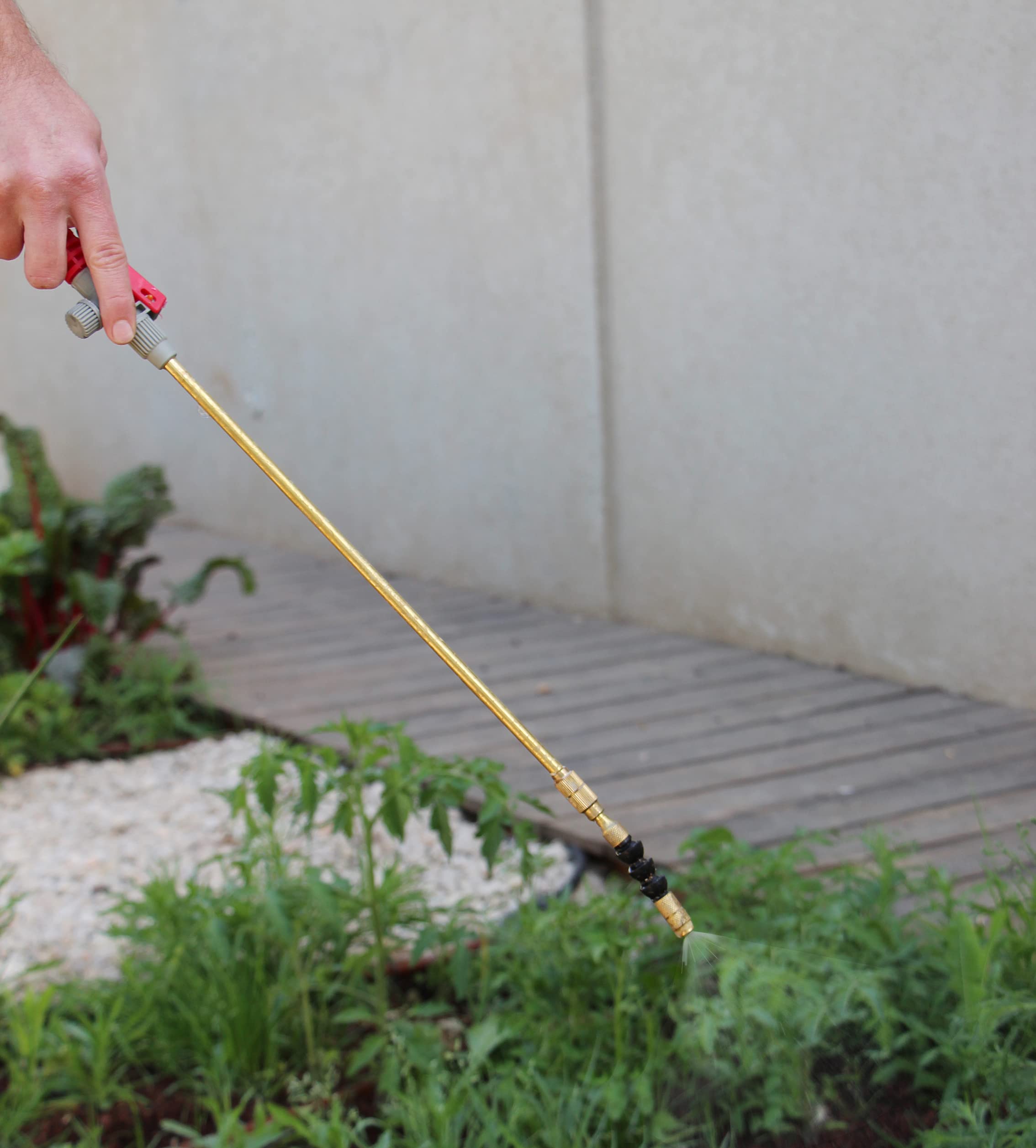 TABOR TOOLS telescopic brass wand extended for reaching tall plants and gutters