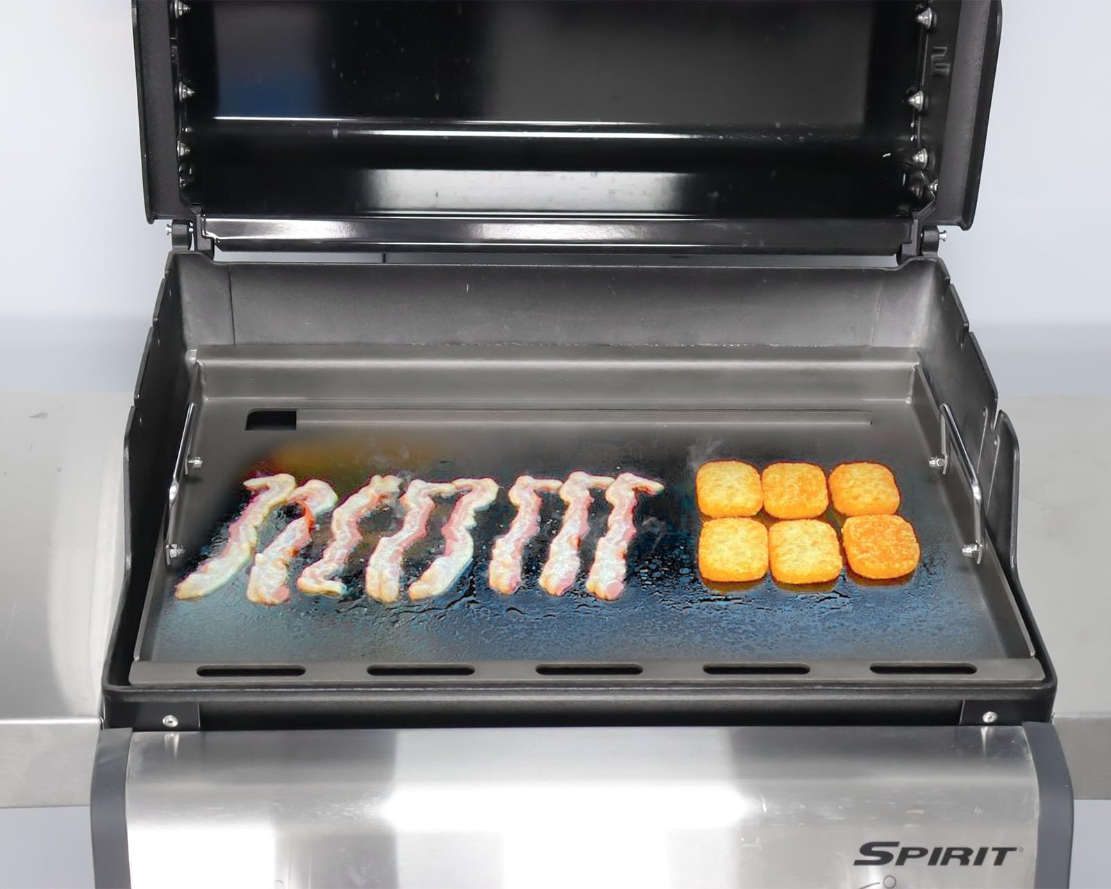 TAILGRILLER griddle beside ruler showing 17.4x22.6 inch scale advantage