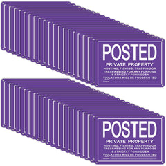 Tandefio front view of sign pack showing purple no trespassing message and quantity