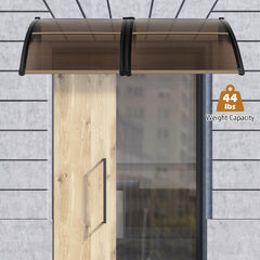 Tangkula awning mounted above door protecting entrance from rain and sun