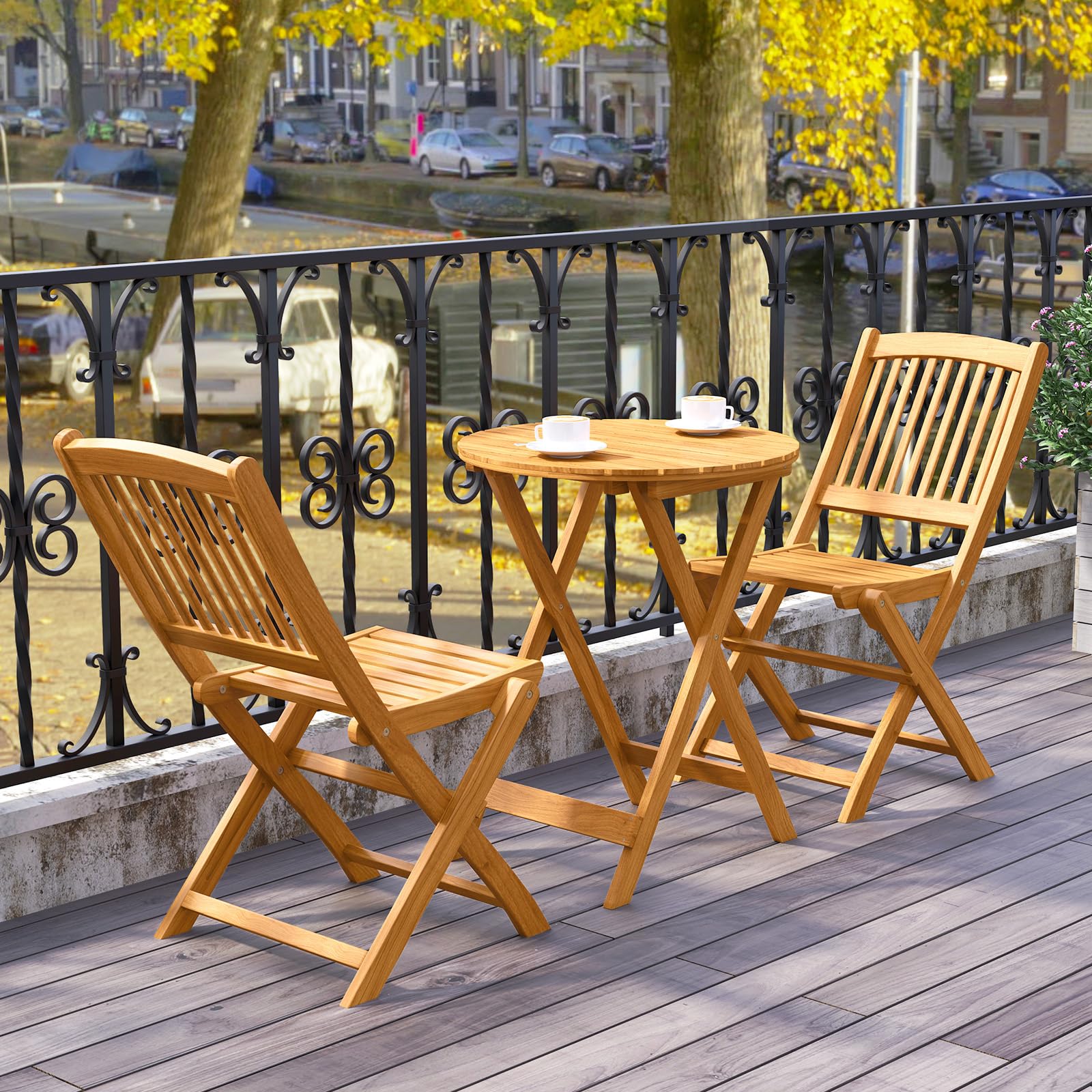 Tangkula chair on balcony lifestyle shot demonstrating space-saving comfort