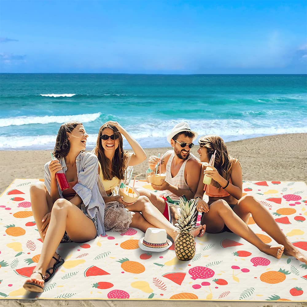 TaTalife spread on beach under umbrella showing sand resistance