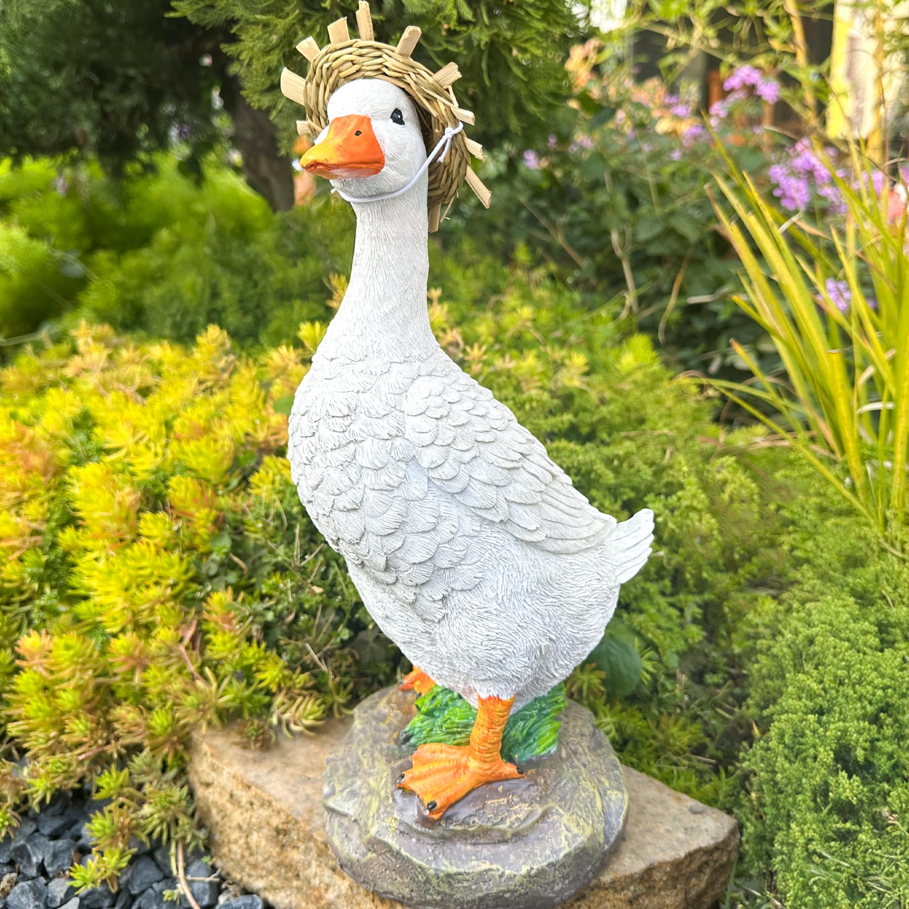 Teaeeno duck by flowerbed showing scale and garden fit