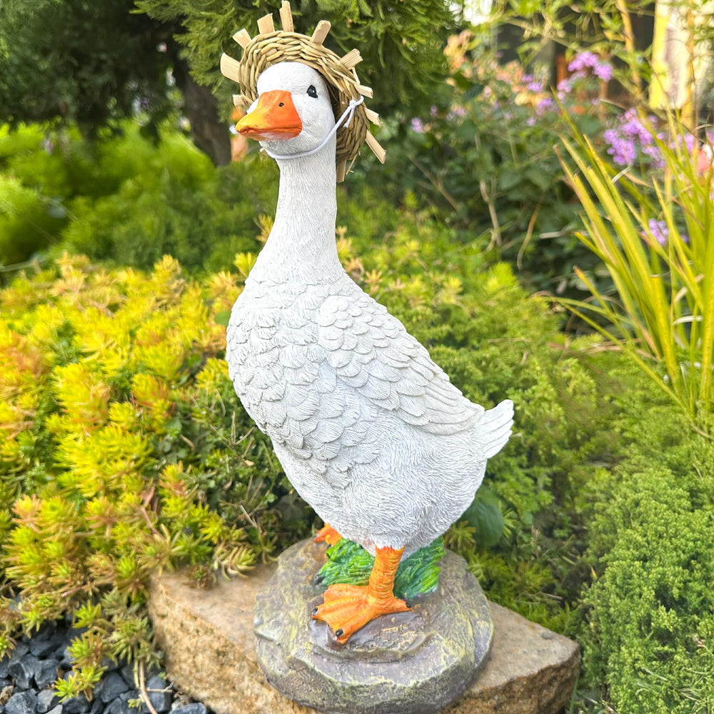 Teaeeno duck by flowerbed showing scale and garden fit