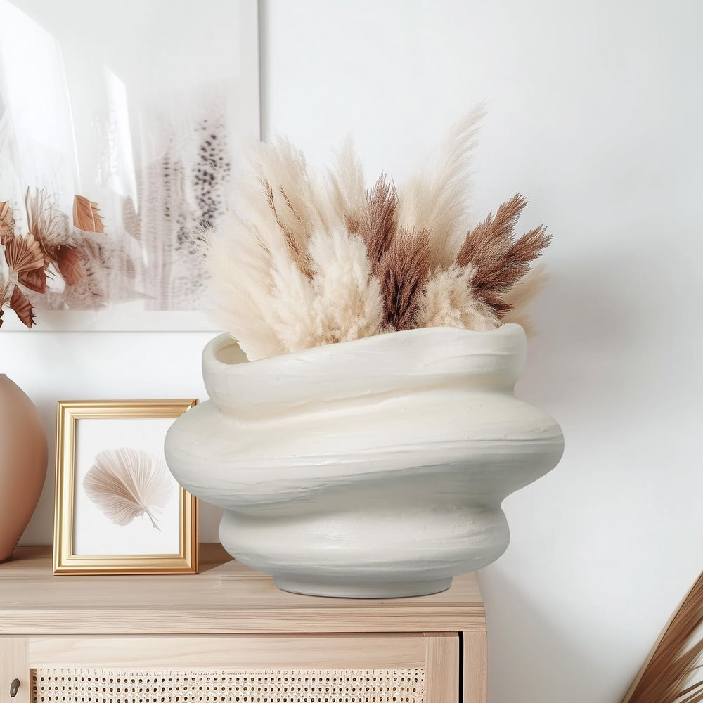 Teagas pot styled with foliage in living room adding modern decor appeal