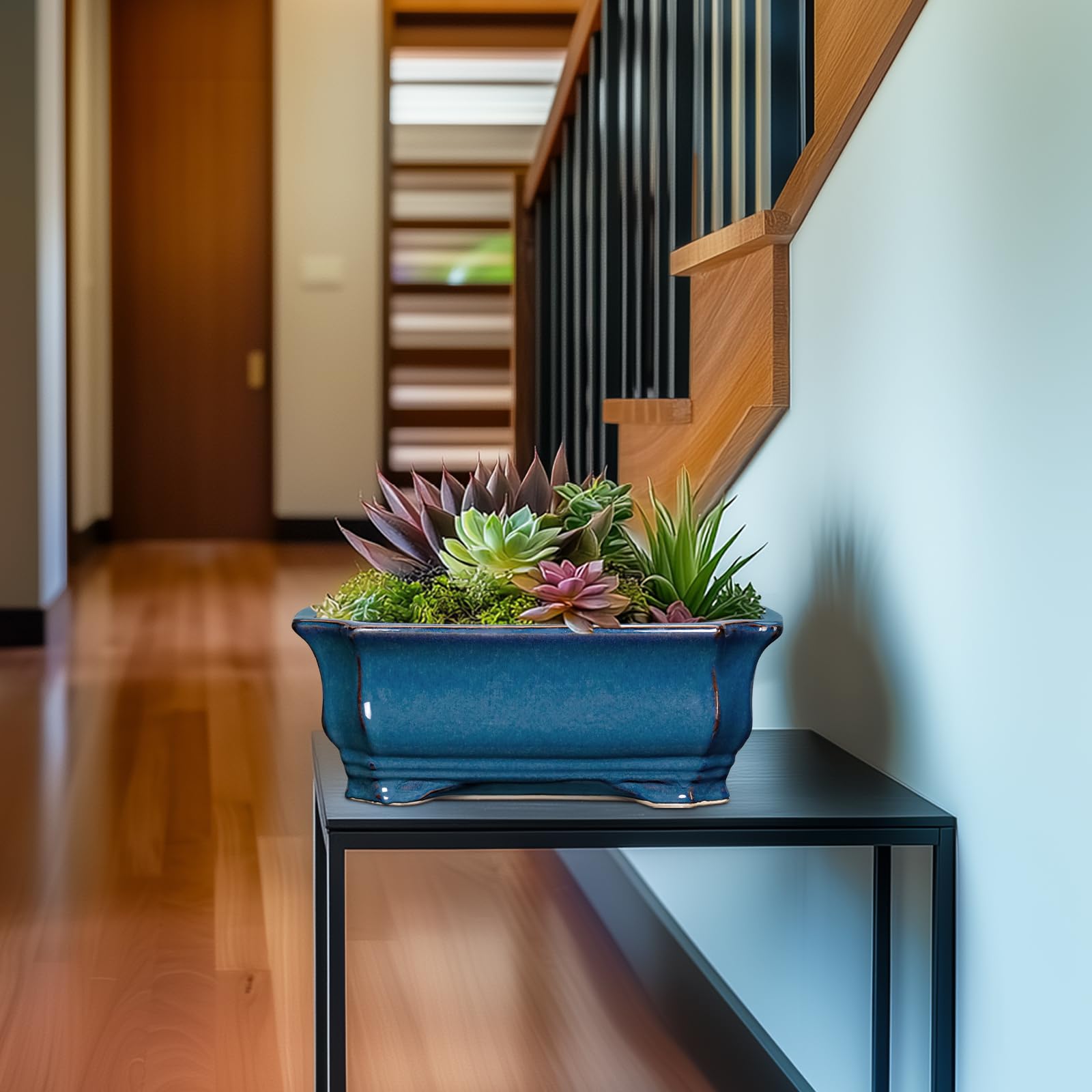 Teagas planter staged with succulents on a shelf, enhances décor and plant presentation