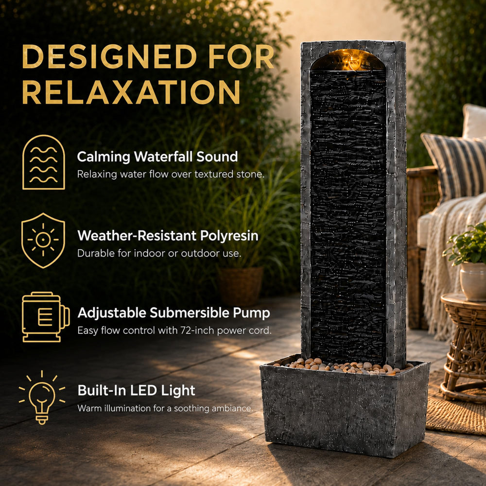 Teamson Home fountain lit by LED at night creating soft illuminated water effect