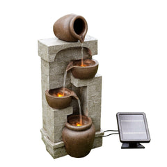 Teamson Home fountain lit by LEDs at night creating soft ambiance