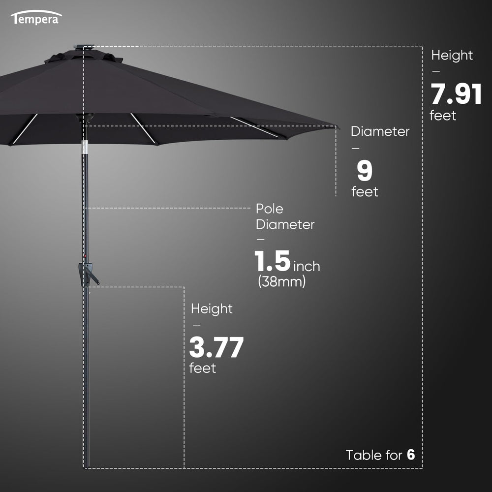 Tempera umbrella next to dining table illustrating 9ft coverage and scale