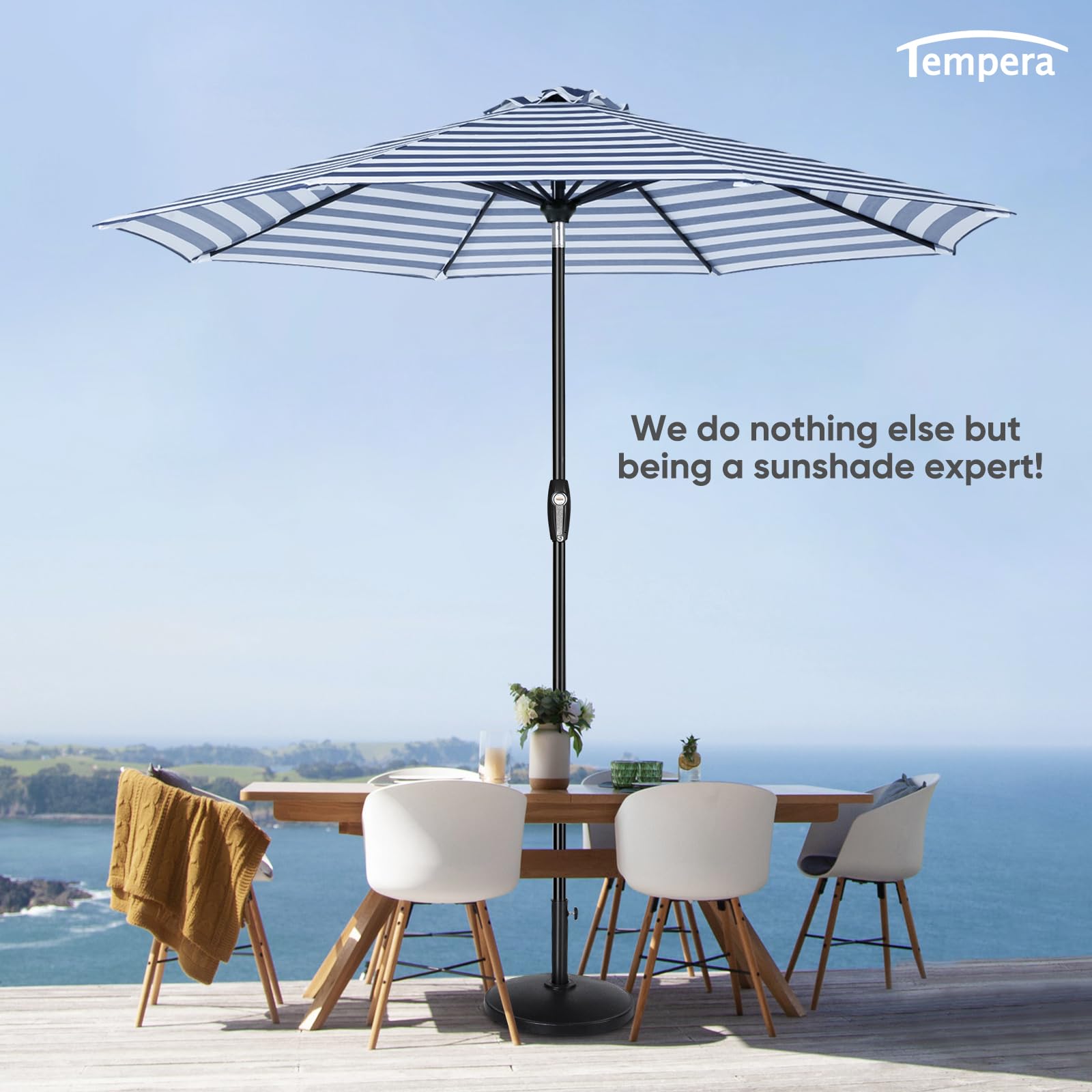tempera umbrella next to 48-inch table showing 9ft coverage for four to six