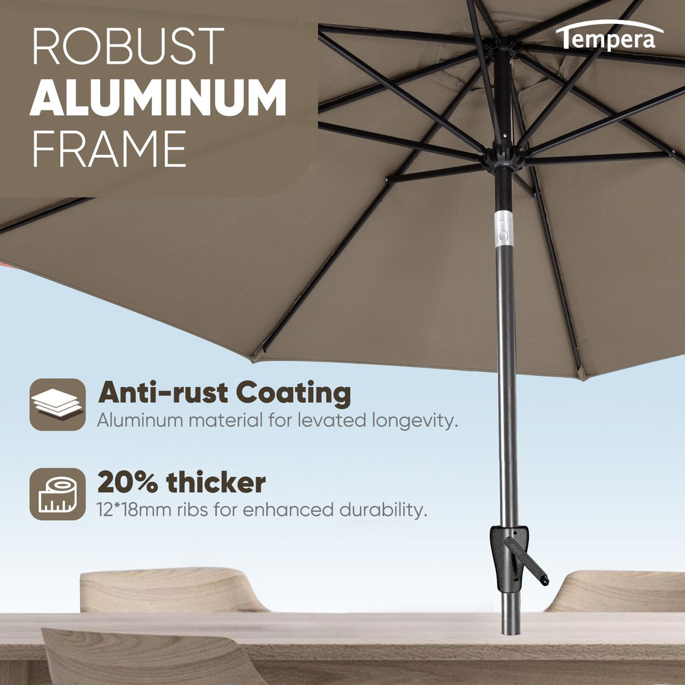 Tempera umbrella shading dining table illustrating comfortable group coverage benefit