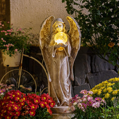 TERESA'S COLLECTIONS closeup of glass orb offering warm golden illumination