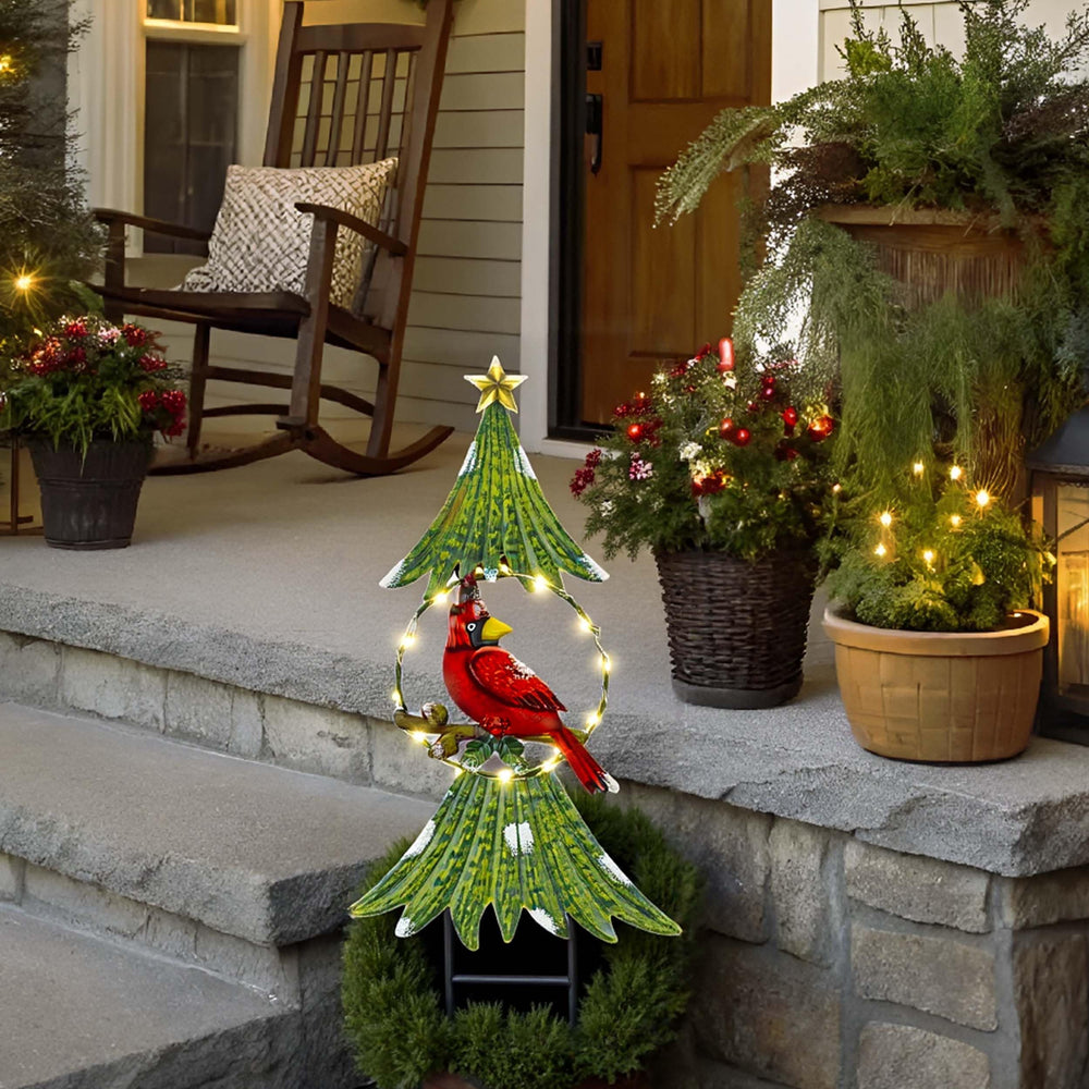 TERESA'S COLLECTIONS illuminated stake at night providing warm festive lighting