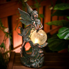 TERESA'S COLLECTIONS close-up of crackle glass globe showing textured glow effect