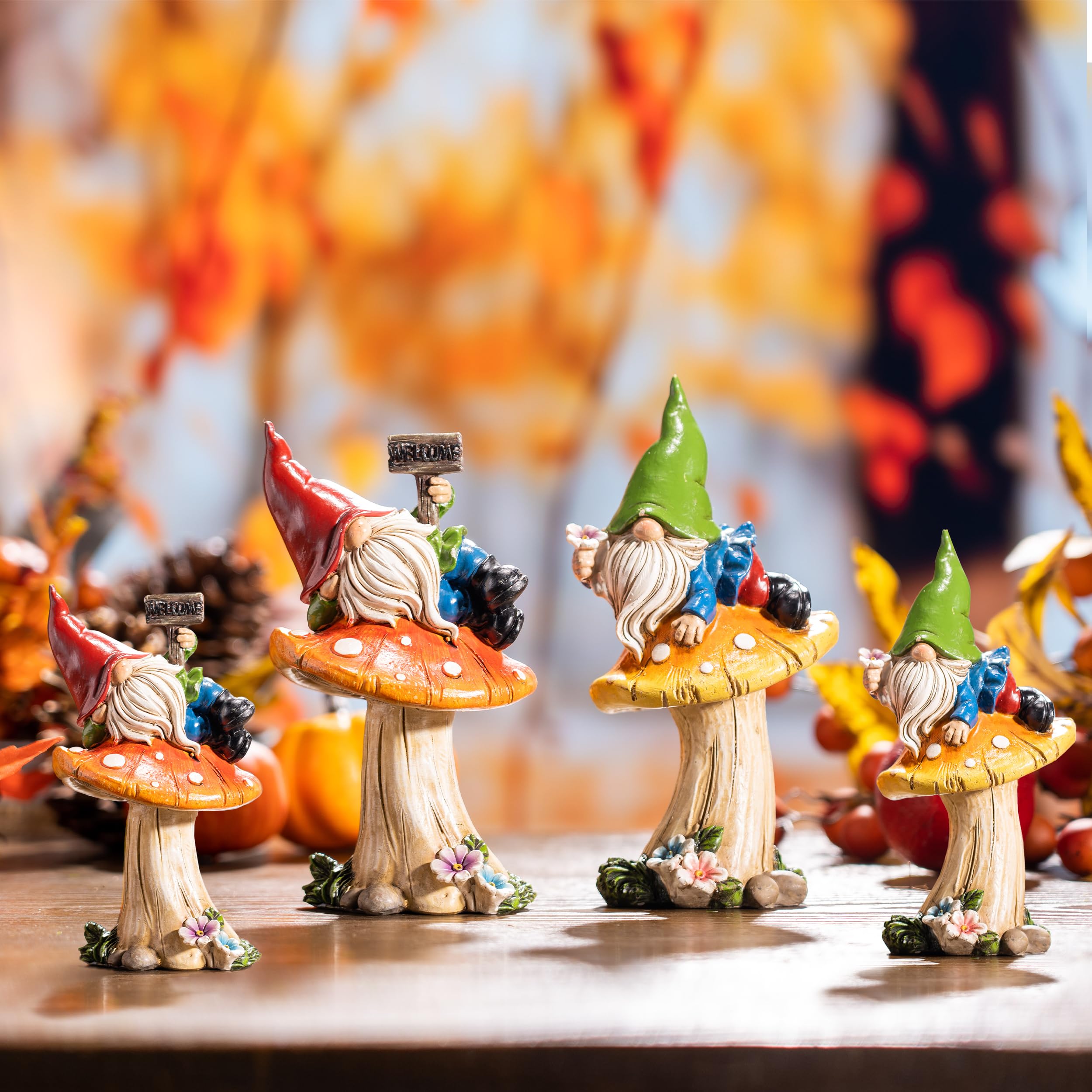 TERESA'S COLLECTIONS gnomes in autumn display with pumpkins and mums showing seasonal charm benefit
