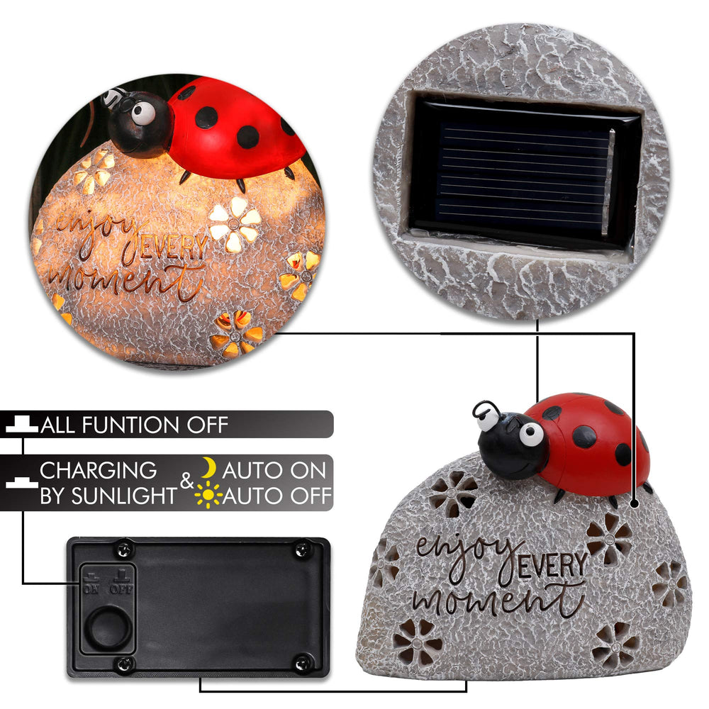 TERESA'S COLLECTIONS ladybug placed in a flower bed adding playful garden accent