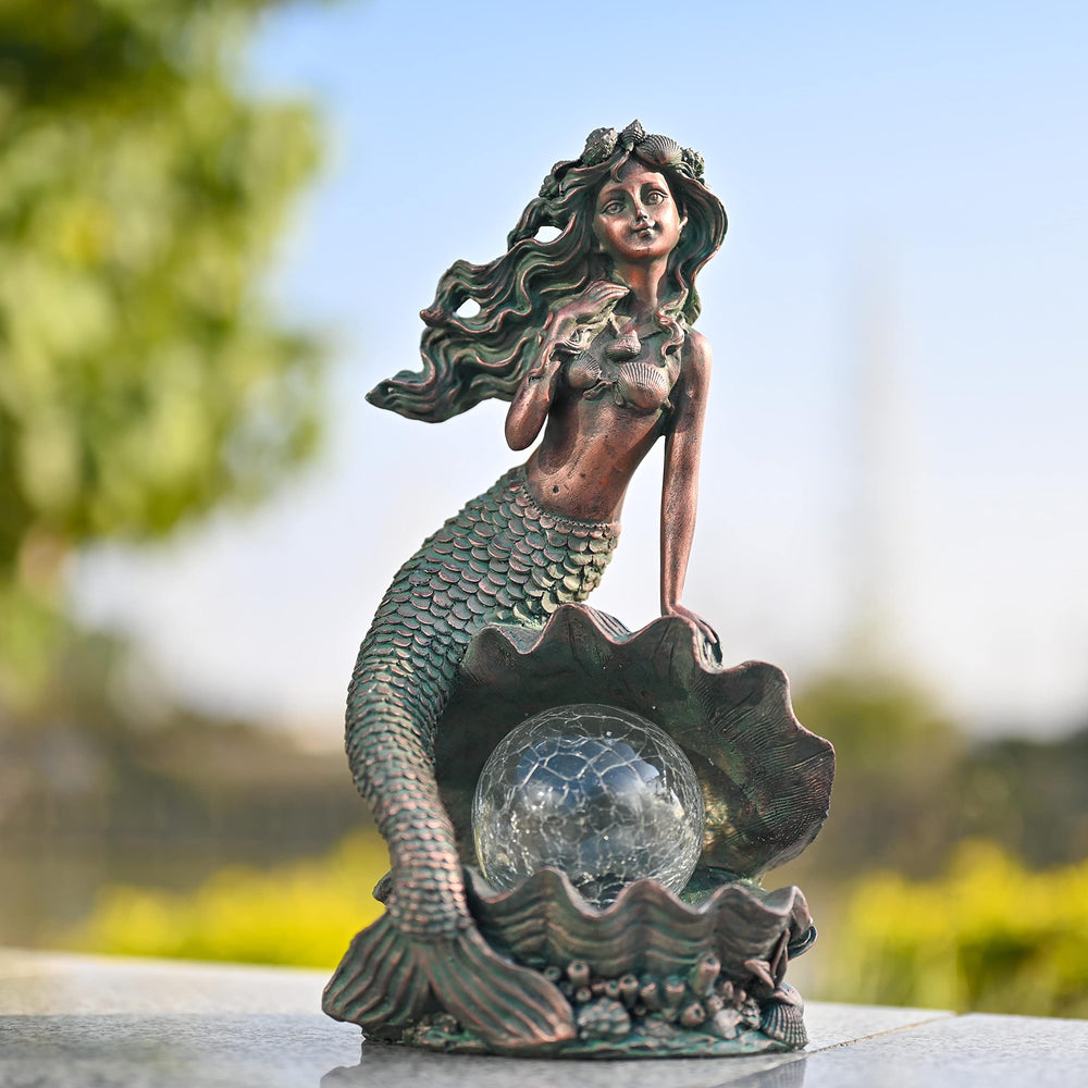 TERESA'S COLLECTIONS side profile of mermaid sculpture showing sculpted detail