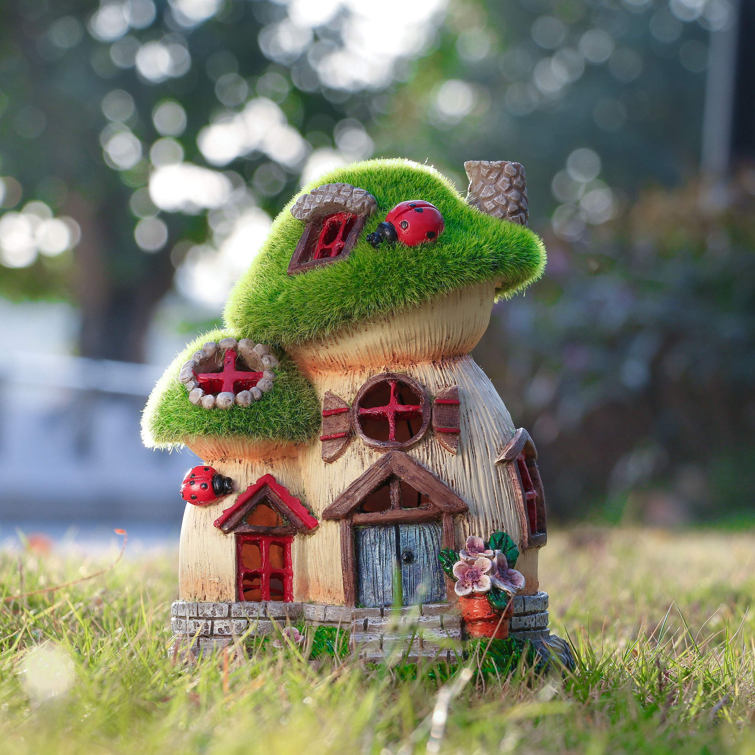 TERESA'S COLLECTIONS placed in flower bed adding decorative interest and color