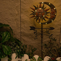 TERESA'S COLLECTIONS close-up of sun and moon face bronze finish highlighting texture and artistic detail