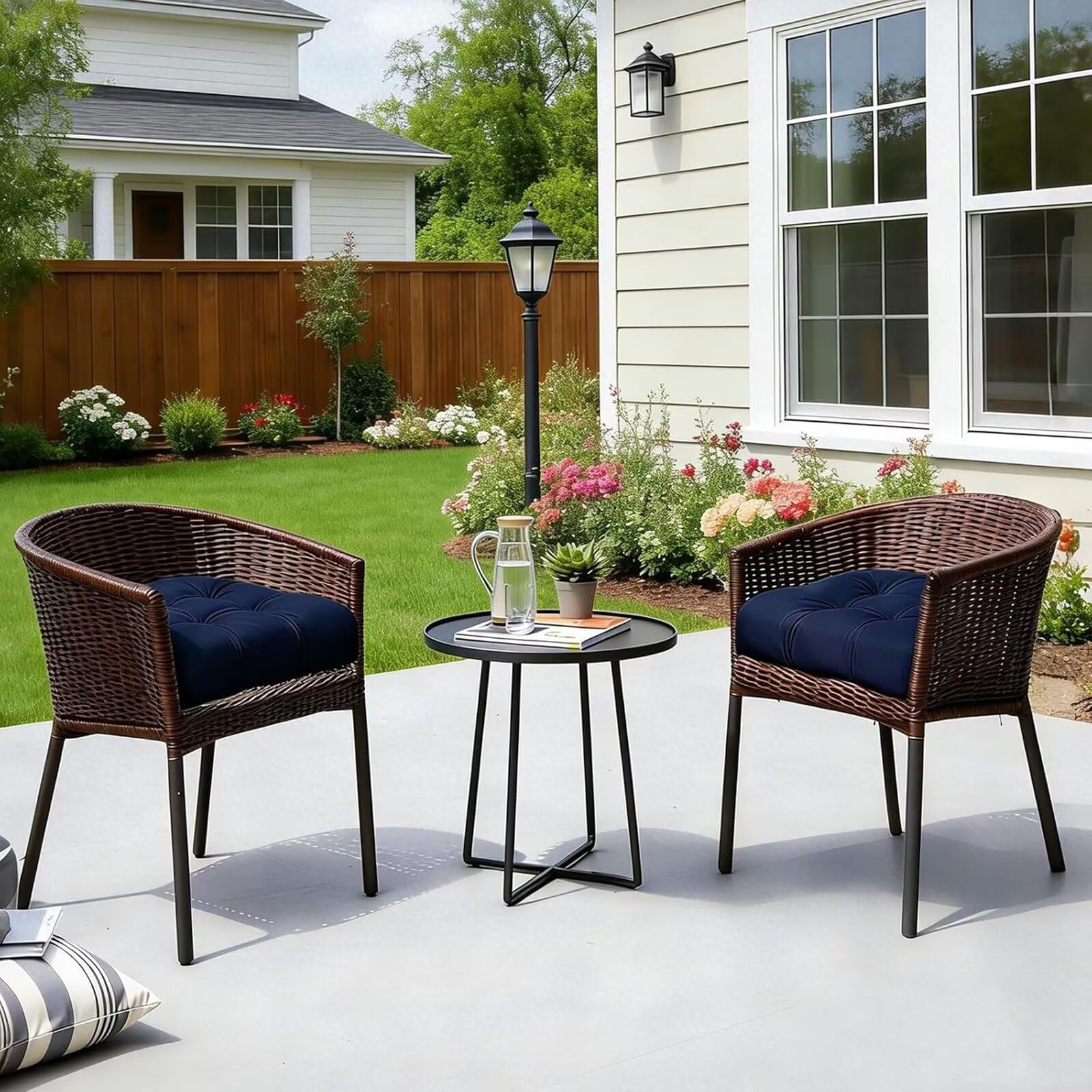 TESICA two cushions placed on a bistro set demonstrating outdoor styling
