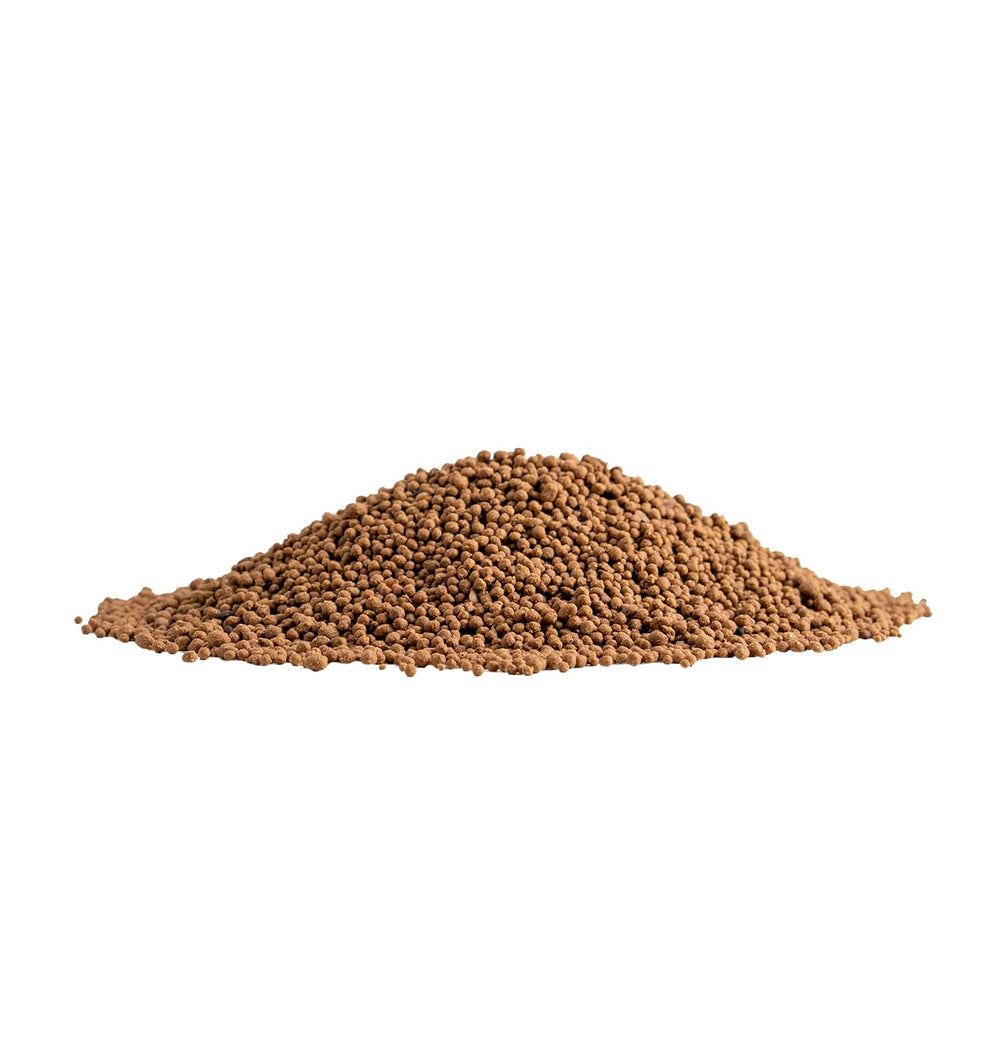 Close-up of DuoCide DG granules texture illustrating quick dispersion