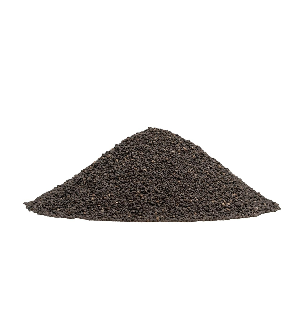 Close-up of Green Shocker granules demonstrating small particle size for even spread